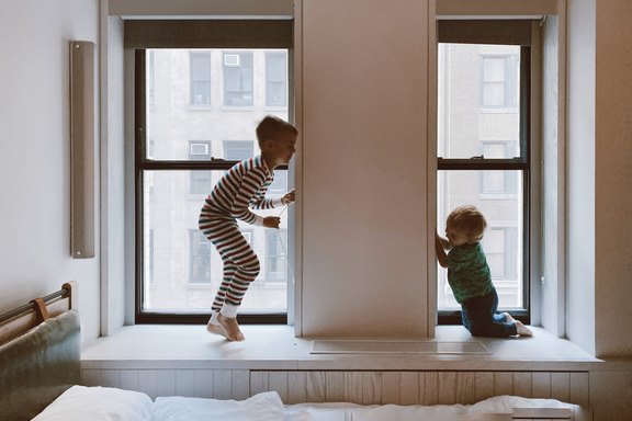 Two Kids two-kids-playing-beside-glass-windows-3273851.jpg
